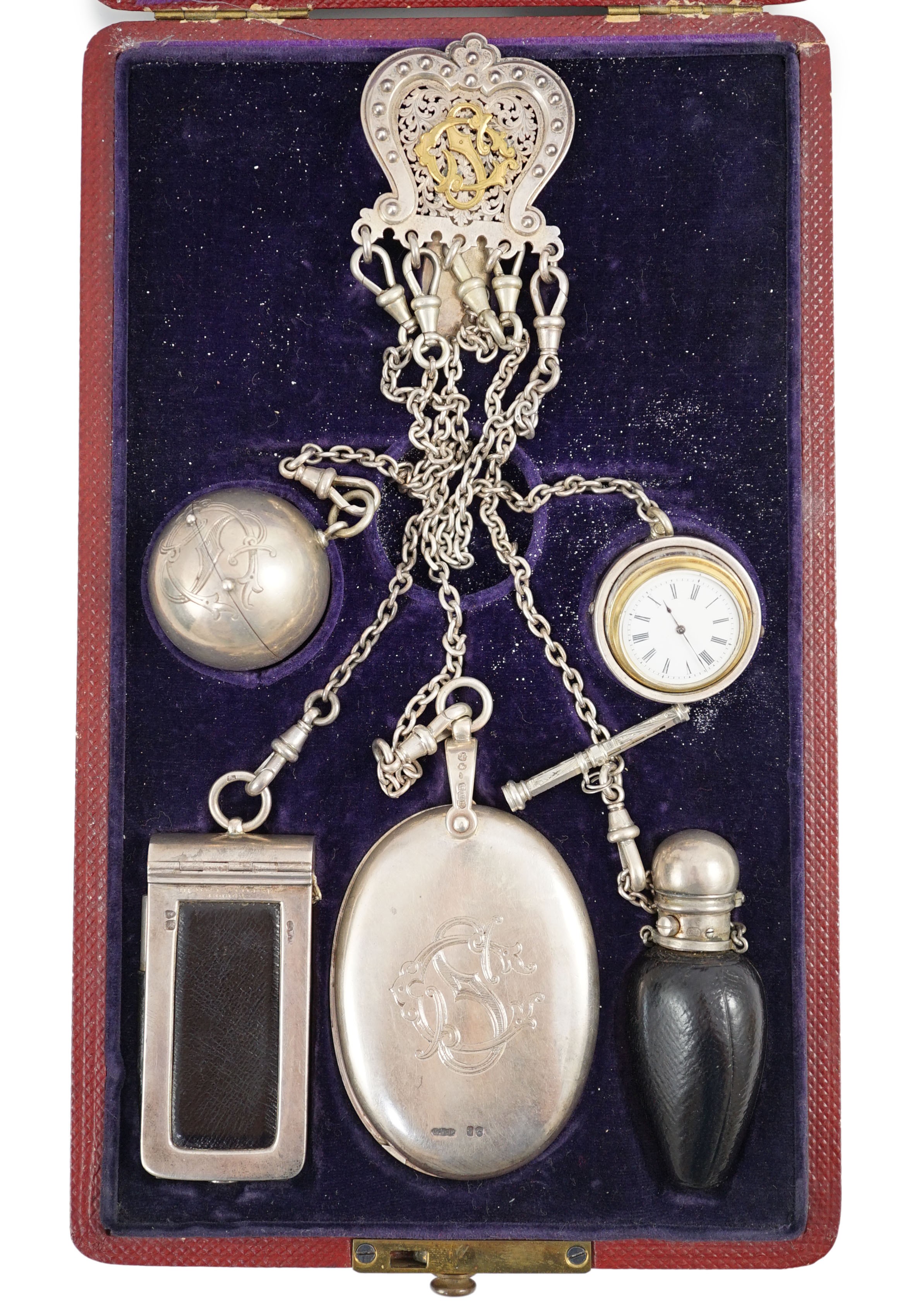 A cased Victorian silver chatelaine by Henry William Dee, London, 1874